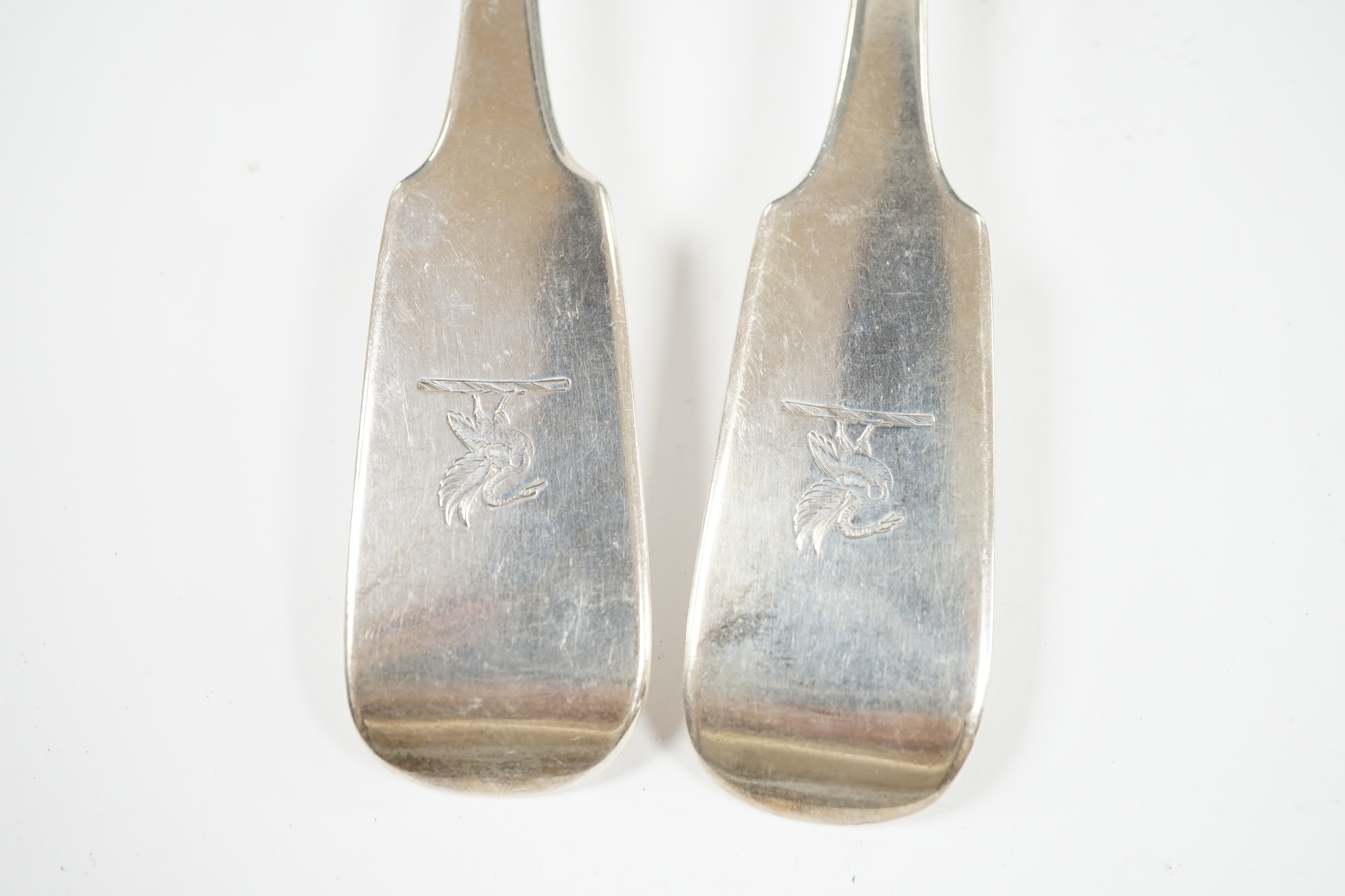 A pair of George IV Irish silver fiddle pattern basting spoons, James Brady, Dublin, 1828, 30.4cm, 7.6oz. Condition - fair